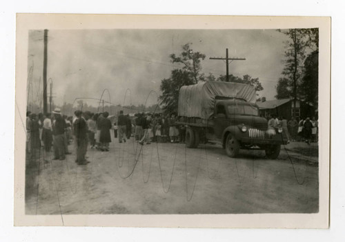Covered truck leaving Jerome camp for Tule Lake camp