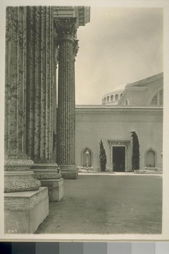 H167. [East facade, Palace of Agriculture. From colonnade, Tower of Jewels.]