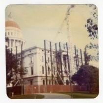 Exterior view of the California State Capitol during restoration. This view is looking northeast