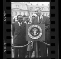 President Lyndon B. Johnson at podium with Upper Voltian President Maurice Yaméogo, 1965 [10_1]