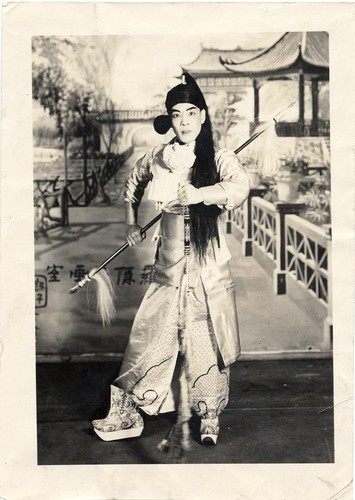 Ma Shi-tsang holding a spear and riding crop, possibly staged at the Great Star Theatre /