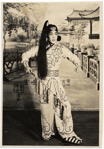 Ma Shi-tsang holding a riding crop, possibly staged at the Great Star Theatre /