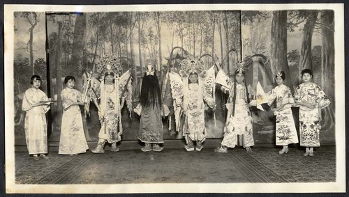 Four warriors flanked by four women /