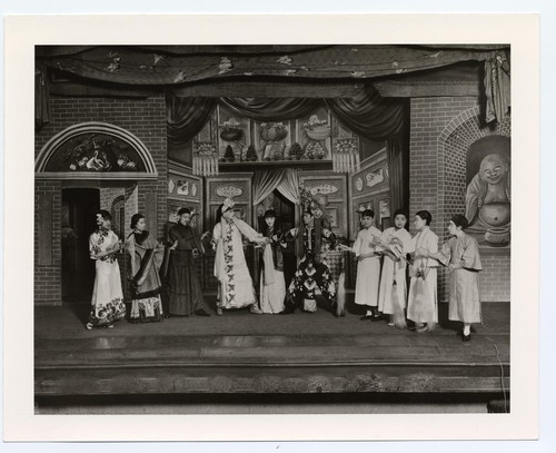 Two warriors in a temple setting confront each other while nuns on the right look on at the Great Star Theatre /