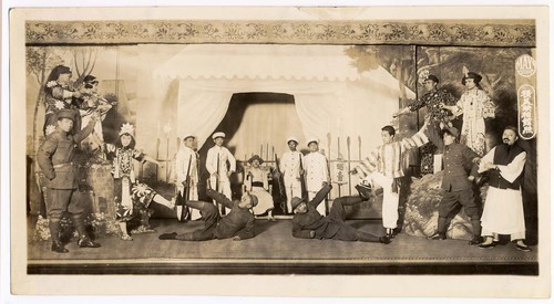 Chinese heroes battle Japanese soldiers and strike a heroic pose, Japanese general is seated in a tent with armed soldiers, staged at the Great China Theatre /