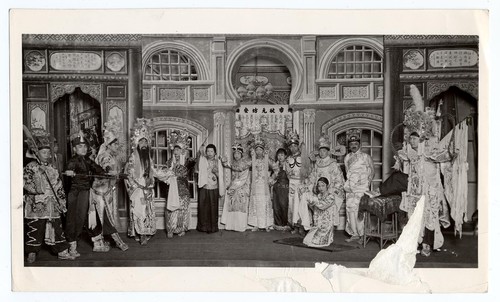 Group scene in palace setting, staged at the Great Star Theatre /