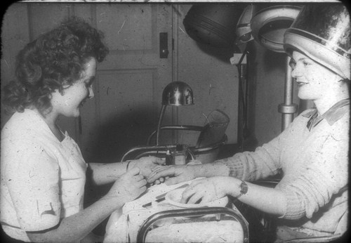 [Two female students in cosmetology class]