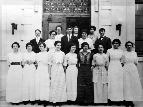 [Photograph of students on steps]