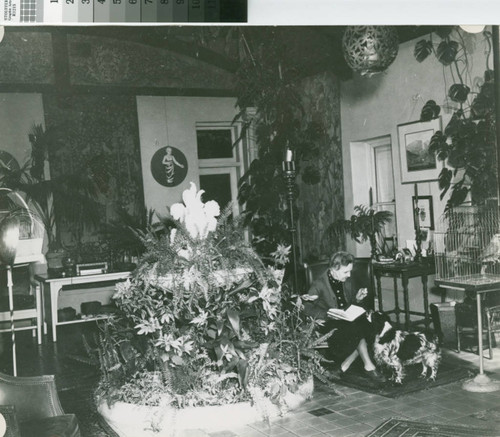 Mary Louise Brand with dog in Solarium