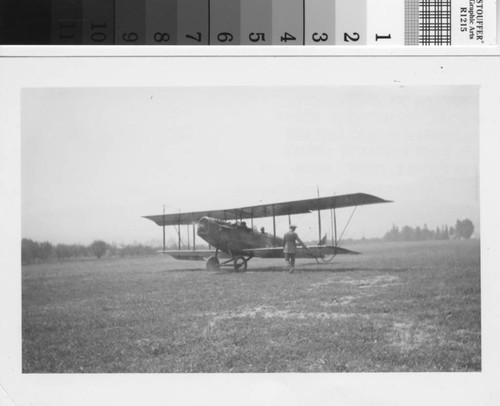 Leslie C. Brand with airplane