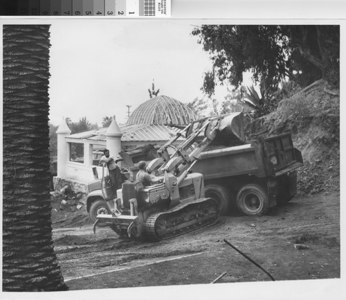 Bulldozer and greenhouse in Brand Park