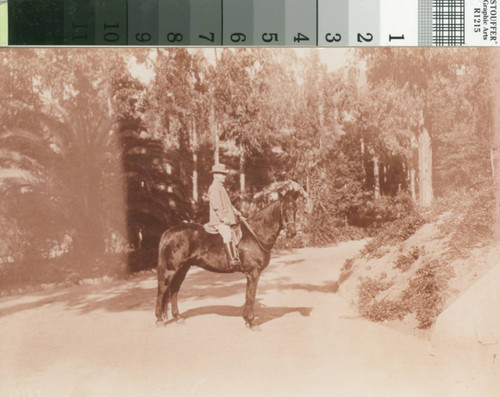 Leslie C. Brand on a horse