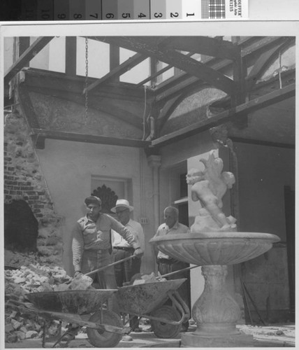 Workmen in solarium during the 1950s Brand Library renovation