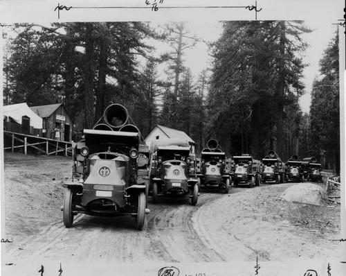 These Mack Bulldogs are at the foot of the Kaiser Pass Road at Huntington Lake, laden with pipe for the Mono-Bear Siphon near Florence Lake