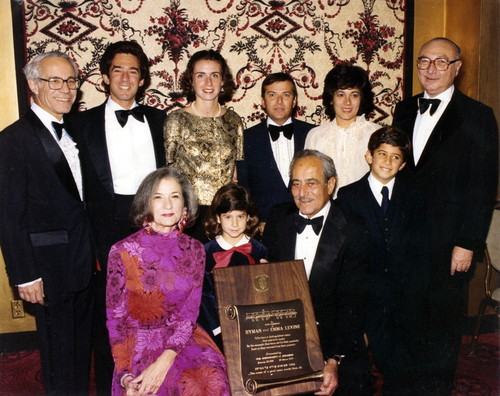 Hyman and Emma Levine family, including Sid Levine receive award with Dr. David Lieber in attendance