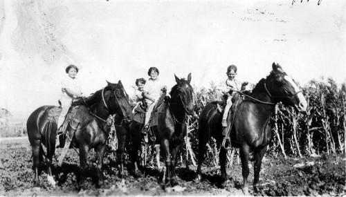 Children horseback riding, (c. 1929), photograph