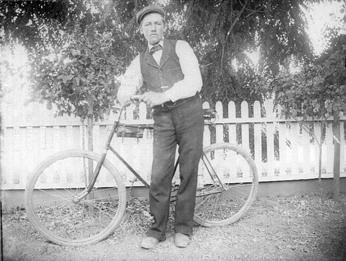 Man and bicycle, (c. 1901), photograph