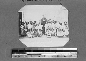 Teacher and school children, Genadendal, South Africa, 1898
