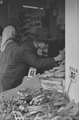 Man shopping at Chinese grocery, San Francisco