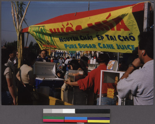 Sugar cane juice booth at the Tet festival at Golden West College, Huntington Beach, California