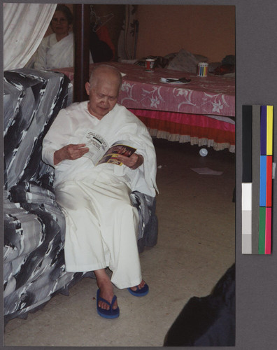 Buddhist nun reading, Glory Buddhist Temple, Lowell, Massachusetts