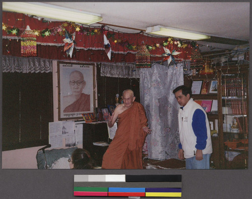 Rithy Uong and monk at Glory Buddhist Temple, Lowell, Massachusetts