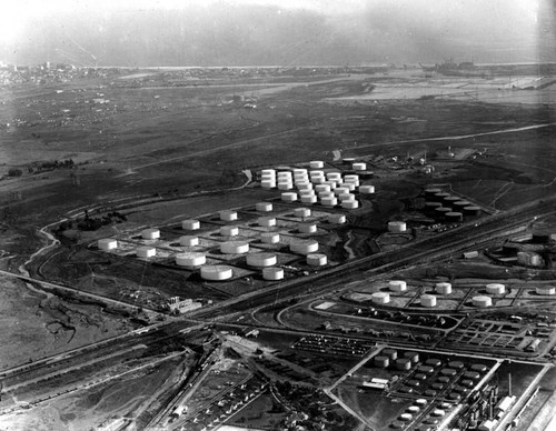 Aerial view of oil refinery tanks, view 1