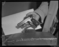 Filmmaker William von Brincken's gun, which police claim proved he lied about an attack on him and his wife, Los Angeles, 1933