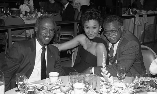 Guy Crowder, Donald Bohana, and an unidentified woman at a special event, Los Angeles, ca. 1983