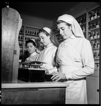Spain: Nurses preparing medicine, Red Cross Hospital, Madrid