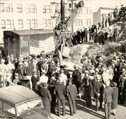 [Crowd gathered at construction site of new U. S. Mint building at Market, Buchanan and Duboce streets]