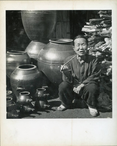 Woman selling pots