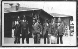 Seven railroad workers in front of the Sebastopol P&SR Depot, 1919 or 1920