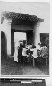 Maryknoll Sisters and catechists doing project at Dongshi, China, 1948