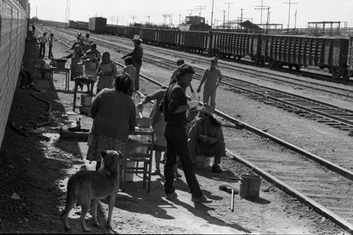 Food vendors at train stop, Mexico, 1983