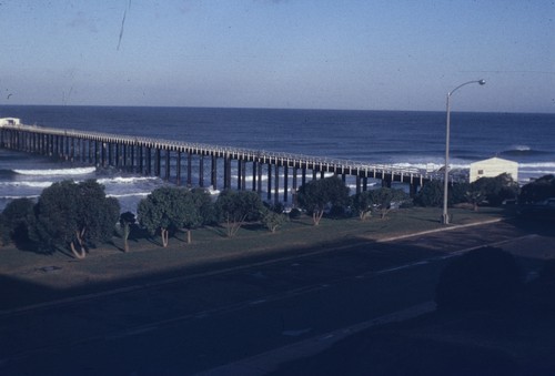 The original Scripps wooden pier, as seen from the roof of Ritter Hall on the campus of Scripps Institution of Oceanography. November 1956