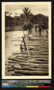 Crossing a bridge, Lukula, Congo, ca.1920-1940