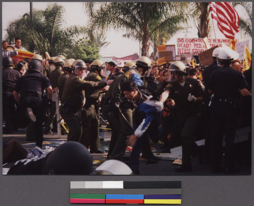 Hi-Tek protestors being pushed back by police, Westminster, California