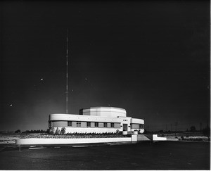 Outdoor photo showing the complete building of KNX radio station
