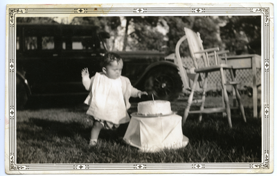 Patricia Roberts, one year old, playing in yard