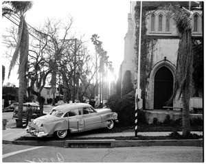 Traffic accident ...actor drives auto up church steps at Hollywood Boulevard and Gardner Street, 1952
