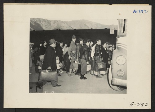 Lone Pine, Calif.--Evacuees of Japanese ancestry arrive here by train and await buses for Manzanar, now a War Relocation Authority center. Photographer: Albers, Clem Lone Pine, California