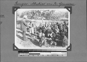 Missionary Gemuseus saying farewell to Africans, Rungwe, Tanzania, 1931