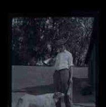 A young man and a dog