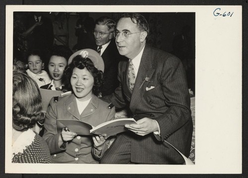 These guests at a get-acquainted party sponsored by the Rochester, N.Y., Committee for the Resettlement of Japanese Americans are participating