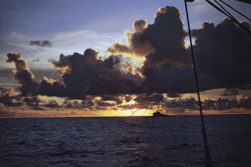 R/V Horizon (ship) shown here in the sunset during the Capricorn Expedition (1952-1953) near the exploration in the submerged Pleistocene atoll called Alexa Bank. 1952