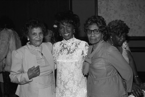 Odessa Bohana posing with two women at her 50th wedding anniversary celebration, Los Angeles, 1984