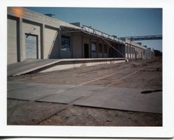 Railroad loading area of the O. A. Hallberg & Sons Apple Products cannery in Graton, California Cannery, 1970s