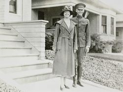Ethel Raymond standing with Oliver P. Wheeler in front of 245 Keokuk Street, Petaluma, California, 1917
