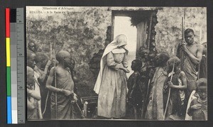Missionary sister dispensing medicine, Rwanda, ca.1920-1940